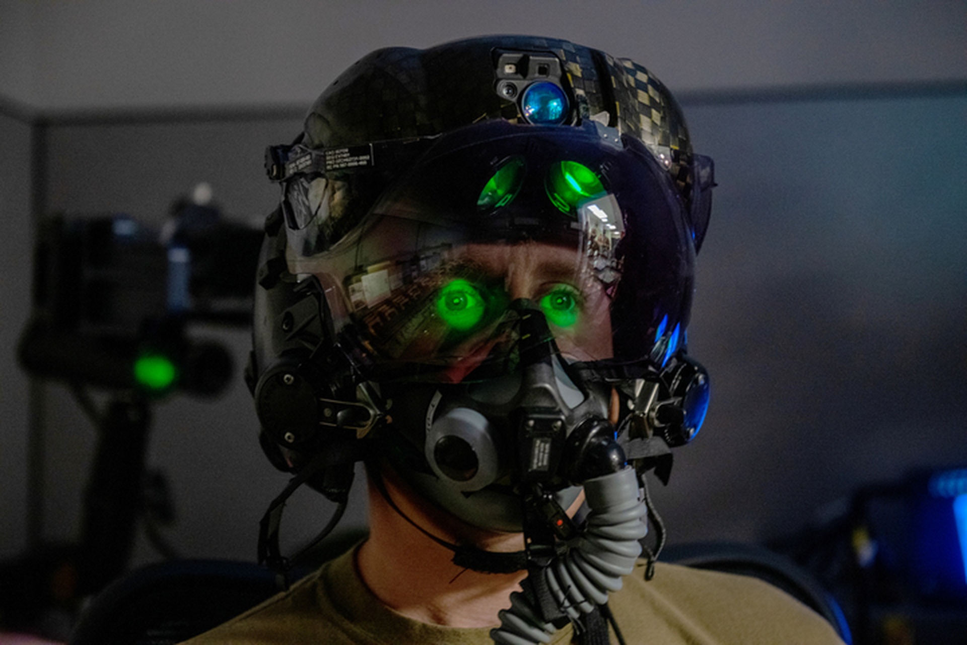 U.S. Air Force Tech. Sgt. Anthony Farnsworth, 419th Operations Support Squadron, wearing the F-35 Generation III Helmet-Mounted Display System, showing the gold visor and integrated display optics